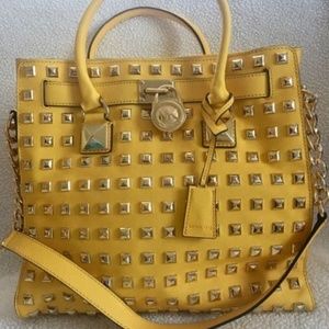 Yellow studded  Michael Kors tote bag